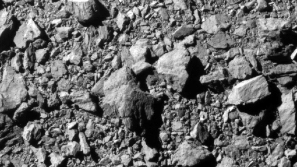 Photo of the rocky surface of an asteroid.